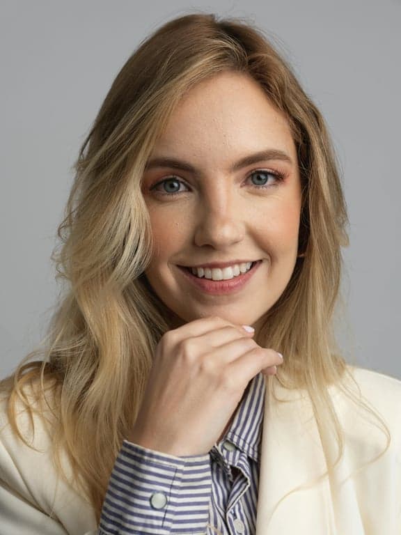 a portrait of a person reimagined as a digital avatar suitable for apps or profiles, featuring consistent lighting, simplified facial detail, preserved proportions, and a polished illustration finish