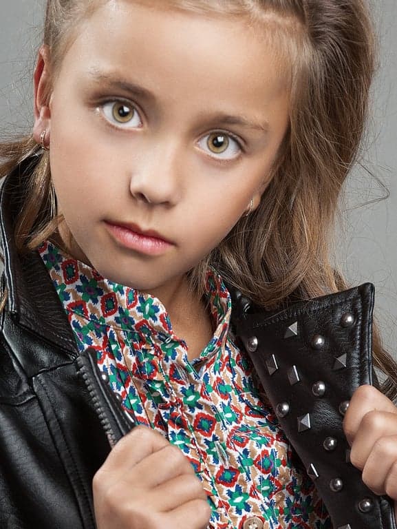 AI red eye remover after transformation - portrait with natural eye color restored