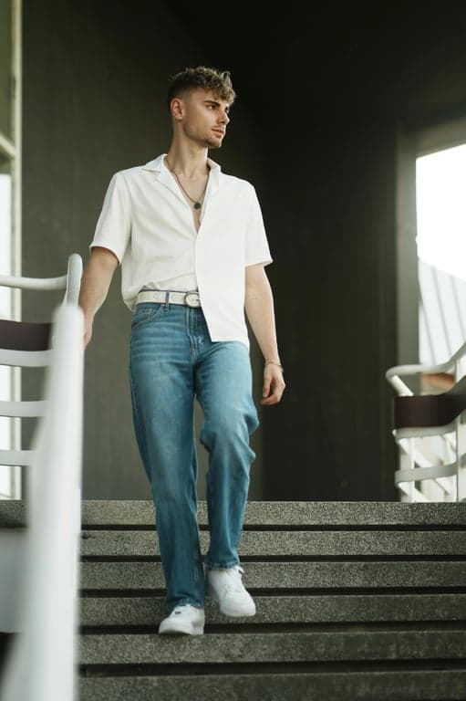 a portrait of a person converted into a semi-realistic avatar illustration, maintaining eye spacing, nose shape, and jaw structure, using smooth shading, minimal noise, and a modern digital art aesthetic