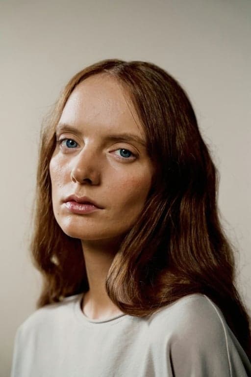 AI tan skin filter after transformation - portrait with natural sun-kissed tan look