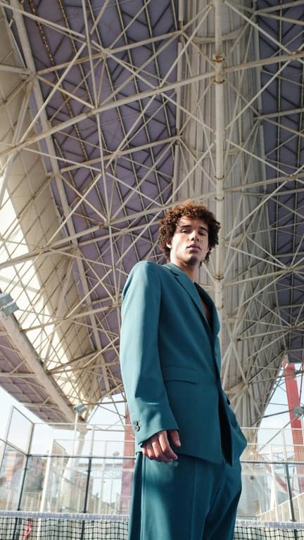 A new male NPC character for the game, looking like a fisherman with a beard and beanie, slightly grumpy but kind eyes, pixel art detail on his sweater.