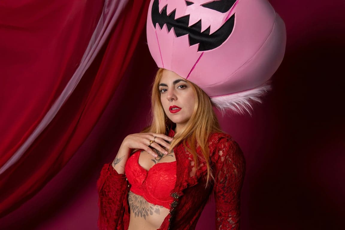 AI ugly filter before photo-woman with a pink pumpkin