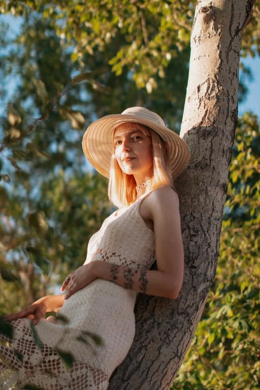 a portrait of a person adapted into a DC superhero comic art style with structured anatomy, intense expression, cinematic lighting contrast, and classic western comic book rendering