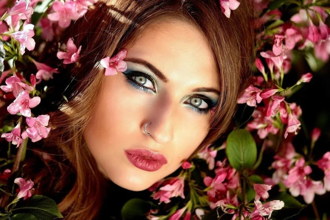 AI piercing filter after transformation - selfie showing AI generated piercing accessories