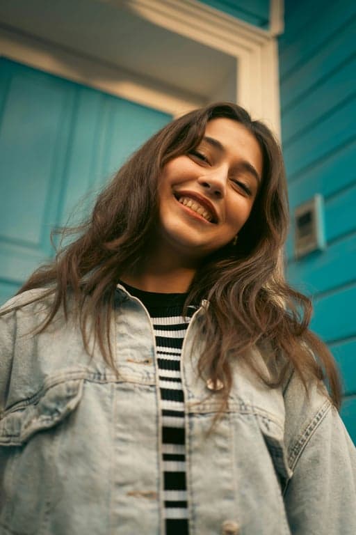 a portrait of a person redesigned as a Looney Tunes-style cartoon figure with dramatic facial acting, oversized eyes and mouth, elastic cartoon proportions, bold outlines, smooth cel shading, and a playful slapstick animation look.