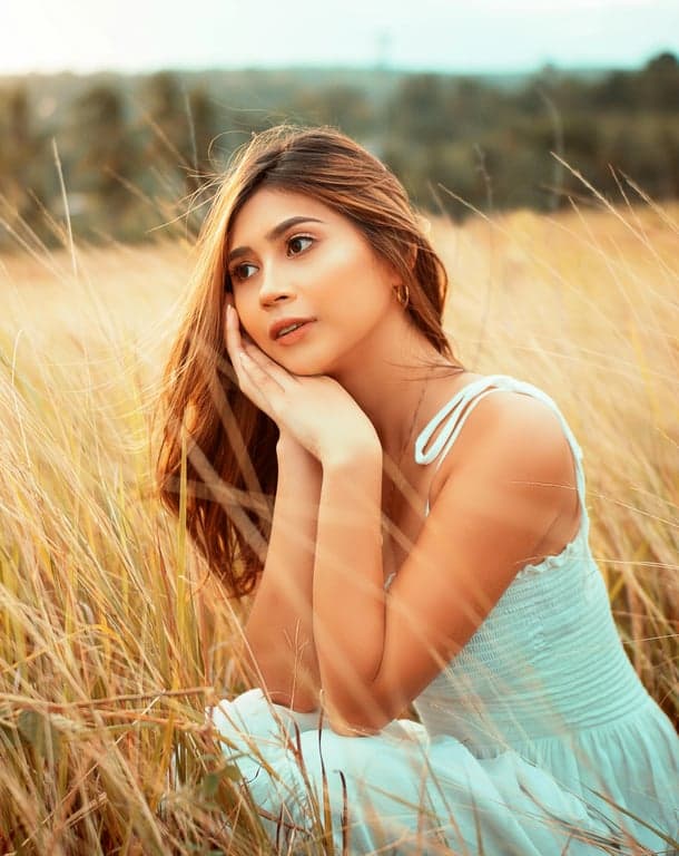 a portrait of a person transformed into a Marvel Comics–style illustration with bold ink contours, exaggerated superhero facial structure, flat color blocks, and classic comic book shading