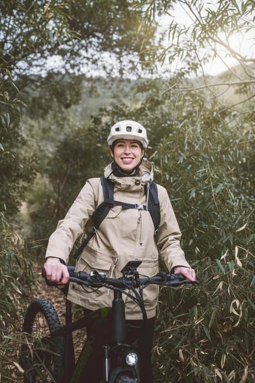 a portrait of a person engaged in an active hobby like hiking or cycling, captured candidly with natural sunlight and a genuine expression