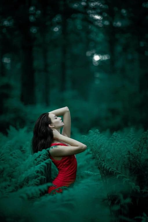 a portrait of a person recolored with deep black hair while keeping natural highlights and texture