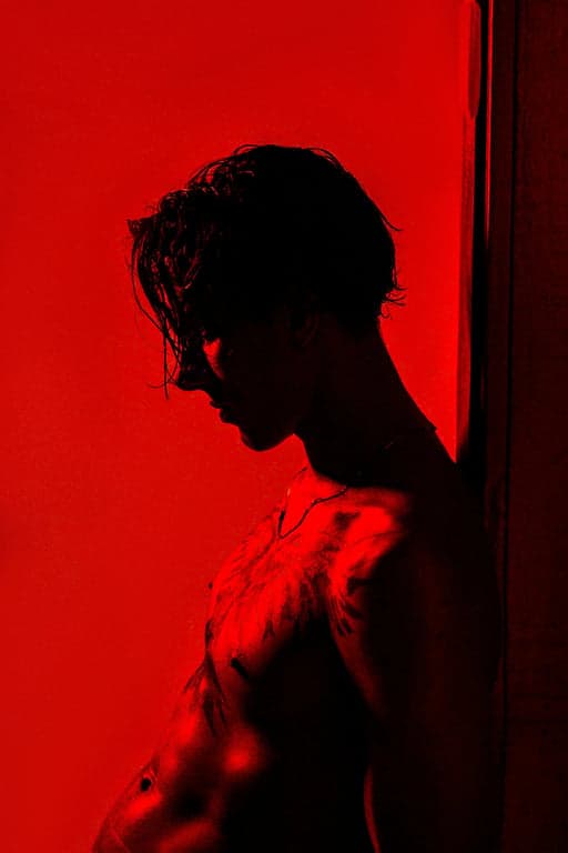 AI remove color from image before photo - person silhouette with vivid red background