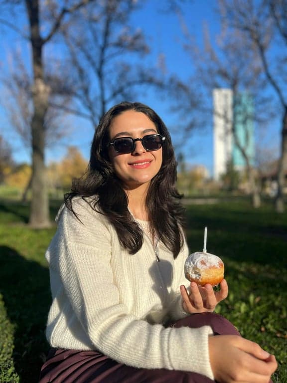 ai remove glasses from photo before photo - woman wearing sunglasses