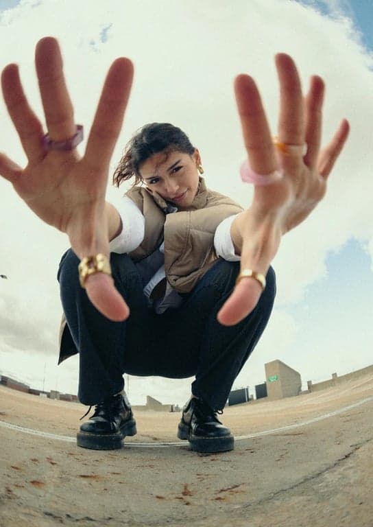 a portrait of a person styled with a dreamy shoujo anime aesthetic, combining delicate facial features, soft colors, and romantic atmosphere