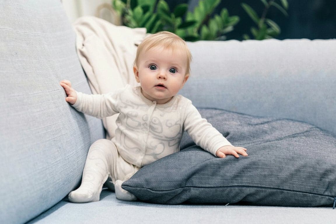 ai pet to human after – a baby lying in a similar pose, inspired by the pet's softness
