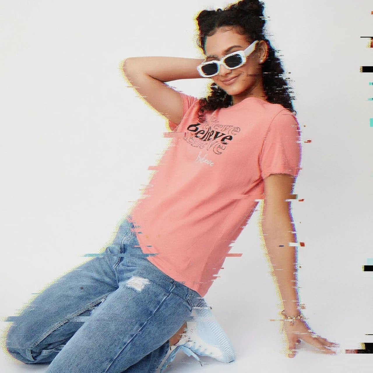 A photo of a girl wearing a simple summer outfit.